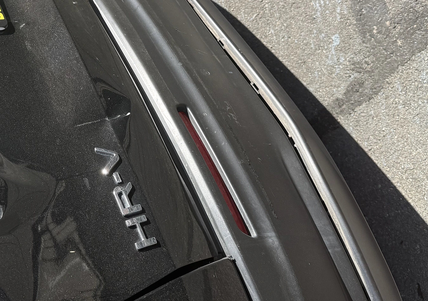 Close detail of vehicle paint and body damage at Glamis Auto Body