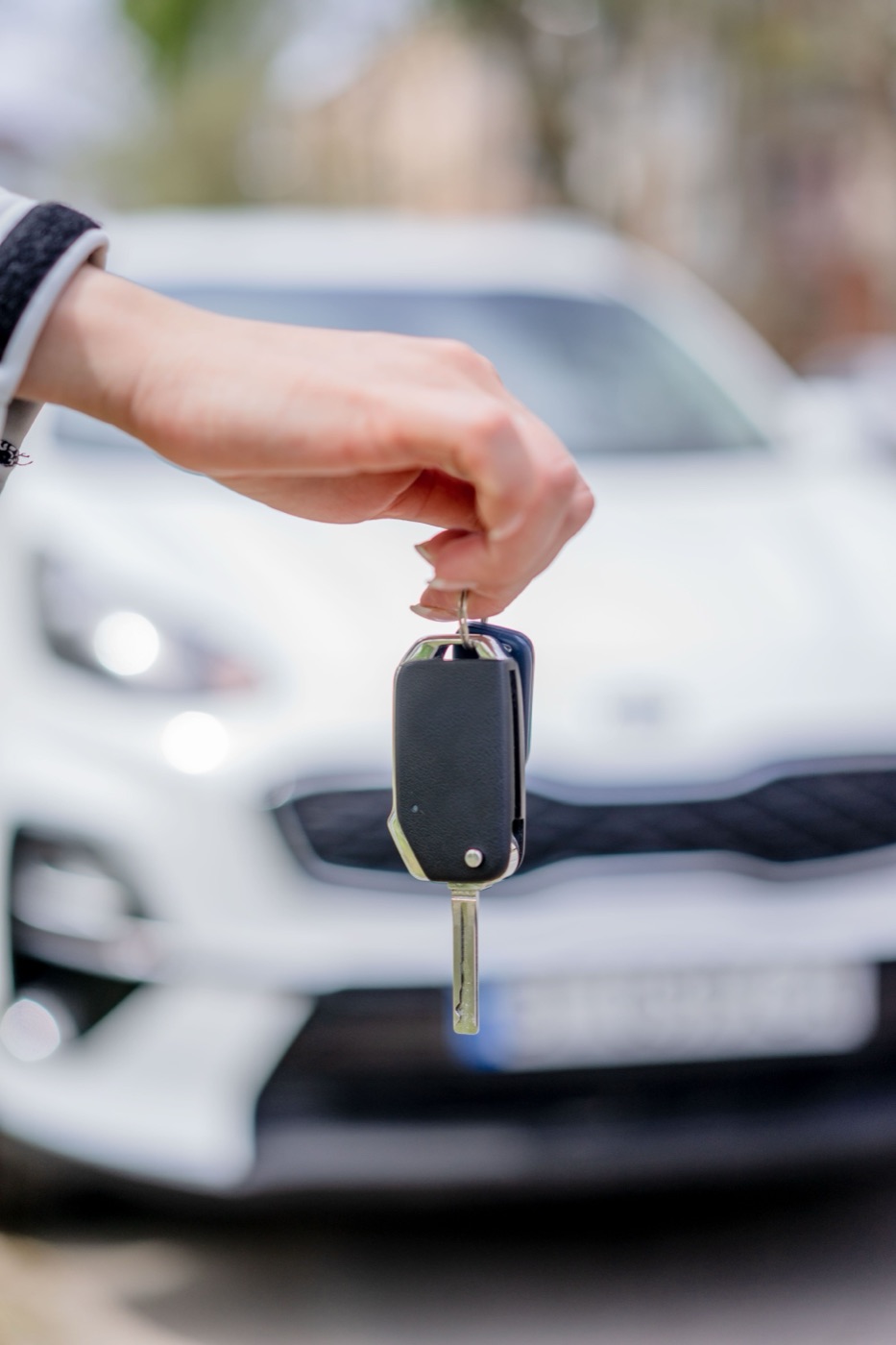 Car key handoff representing rental car support